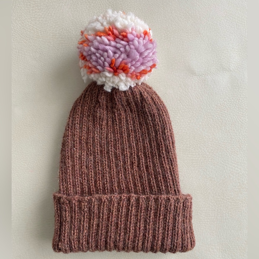 Hand-knit beanie, colorful pom pom